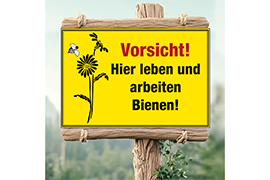 Vorsicht! Hier leben und arbeiten Bienen! mit Blume